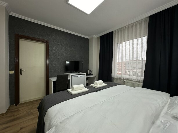Imagen de la habitación del &ouml;zdemir Inn Otel, Balıkesir. Foto 11