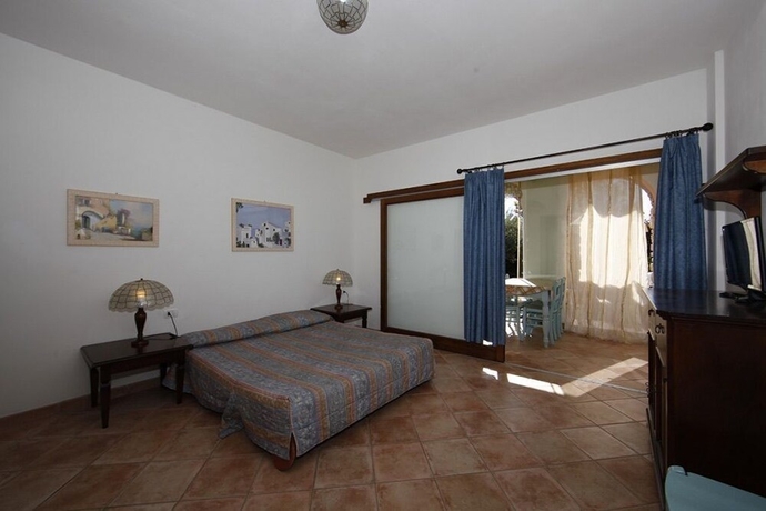 Imagen de la habitación del residence dolores castle. Foto 10