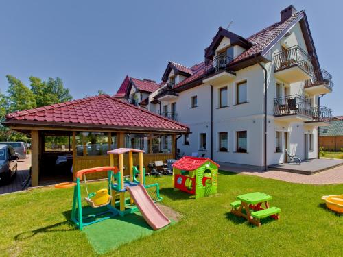 Imagen de los exteriores del villa złota r&oacute;ża. Foto 12