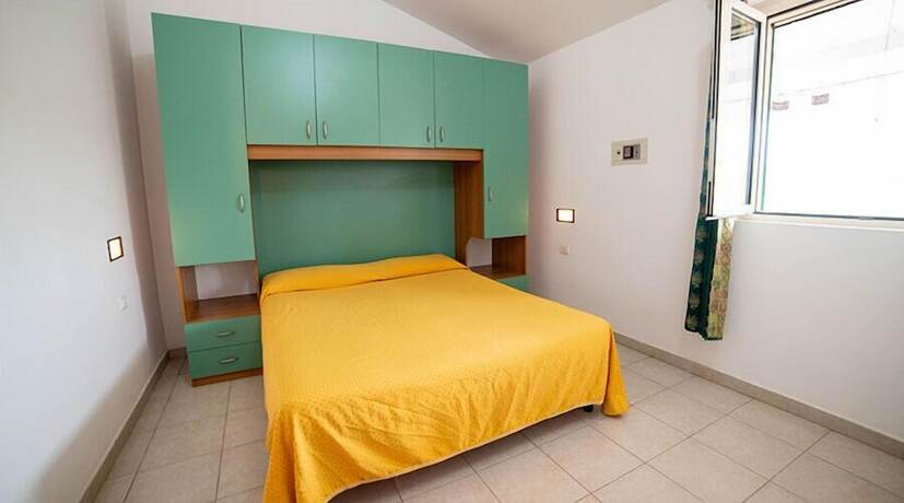 Imagen de la habitación del villaggio turistico il Falco. Foto 14