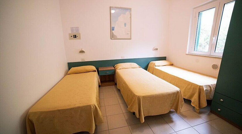 Imagen de la habitación del villaggio turistico il Falco. Foto 20