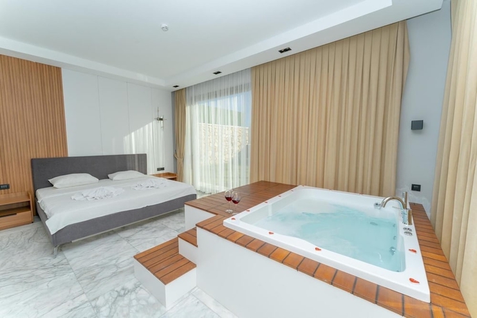 Imagen de la habitación del villas planet luxury. Foto 13