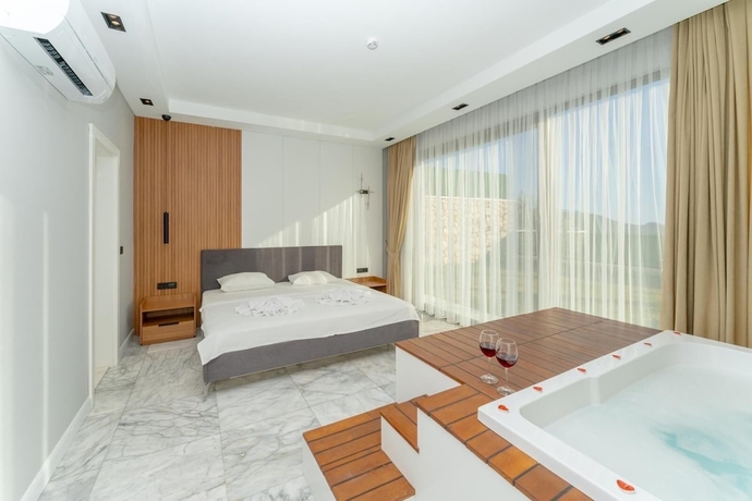 Imagen de la habitación del villas planet luxury. Foto 14
