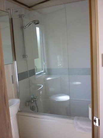 Imagen de la habitación del zu Jeddelohs Rosengarten Hotel and Bungalows. Foto 19