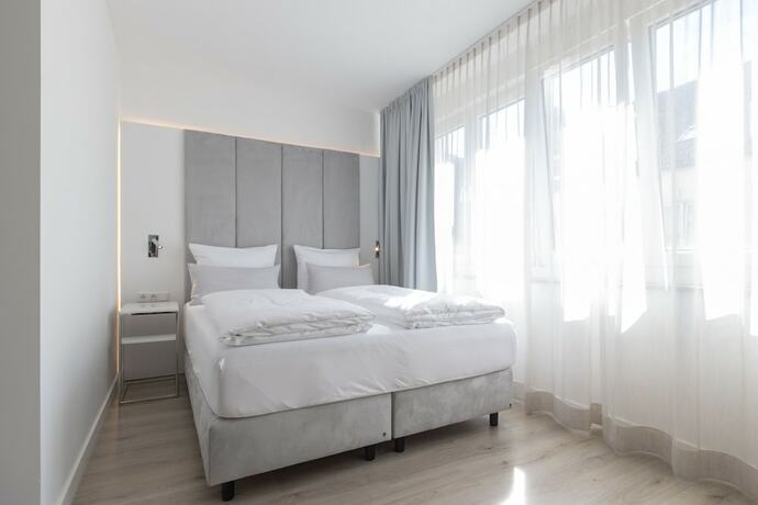 Imagen de la habitación del zzzpace Smart-Hotel Bielefeld. Foto 17