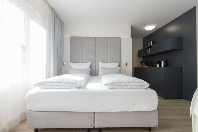 Imagen de la habitación del zzzpace Smart-Hotel Bielefeld. Foto 20