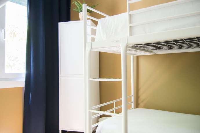 Imagen de la habitación del Albergue Avenue Hostel & Suites. Foto 12