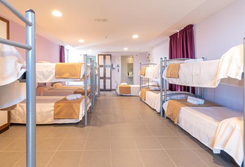 Imagen de la habitación del Albergue El R&iacute;o. Foto 18
