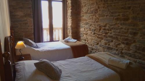 Imagen de la habitación del Albergue La Casona De Sarria. Foto 4