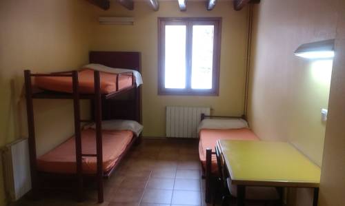 Imagen de la habitación del Albergue La Molina Xanascat. Foto 10