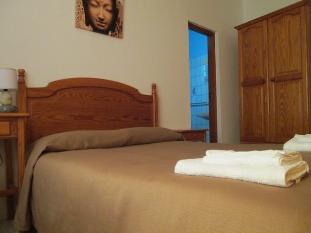 Imagen de la habitación del Albergue La Palma Hostel - Pensi&oacute;n Central. Foto 14