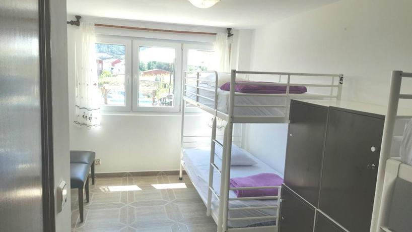 Imagen de la habitación del Albergue Mar de Fora. Foto 5
