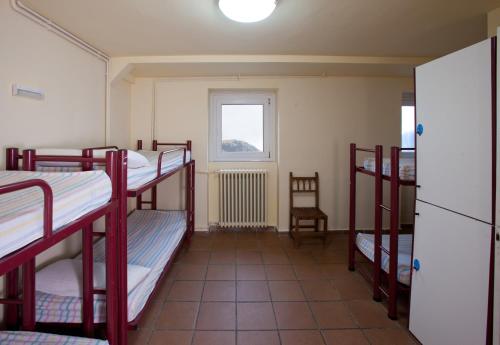 Imagen de la habitación del Albergue N&uacute;ria Xanascat. Foto 18