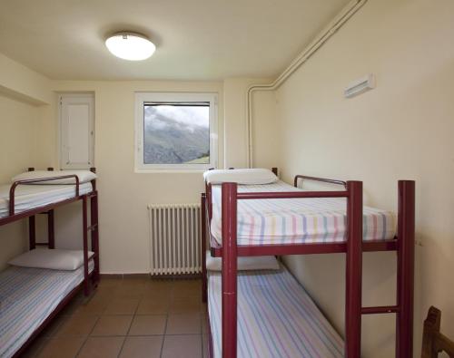 Imagen de la habitación del Albergue N&uacute;ria Xanascat. Foto 20