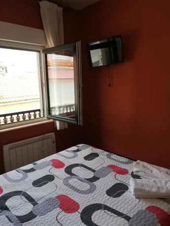 Imagen de la habitación del Albergue O Encontro. Foto 2