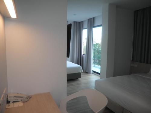 Imagen de la habitación del Albergue Rezt Bangkok. Foto 6