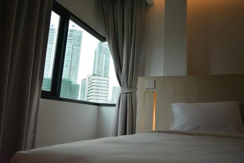 Imagen de la habitación del Albergue Rezt Bangkok. Foto 7