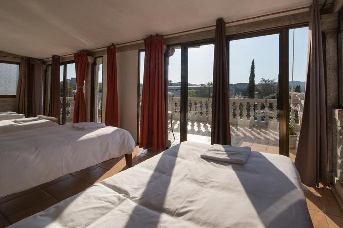 Imagen de la habitación del Albergue Villa San Clemente. Foto 7