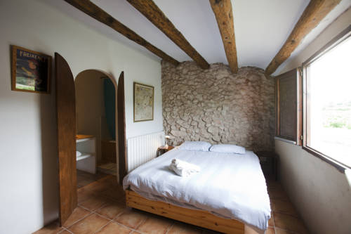 Imagen de la habitación del Alojamiento Rural Cal Pau Cruset. Foto 11