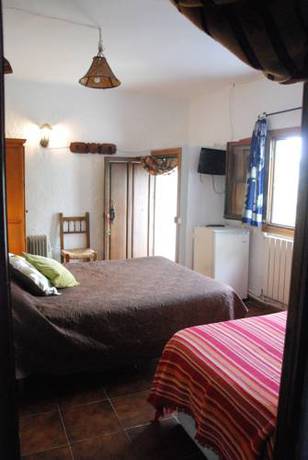 Imagen de la habitación del Alojamiento Rural Casa Ibero Bubi&oacute;n. Foto 11
