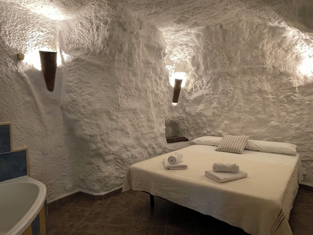 Imagen de la habitación del Alojamiento Rural Cuevas El Atochal Or&iacute;genes. Foto 7
