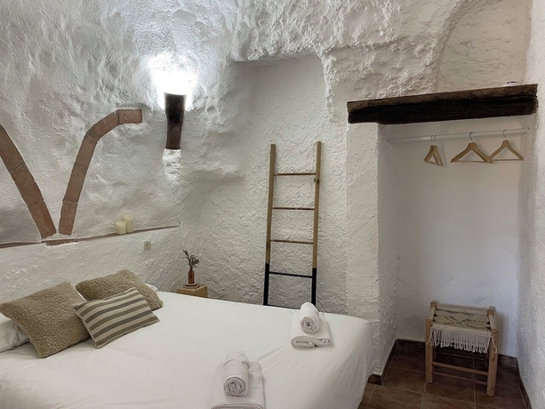 Imagen de la habitación del Alojamiento Rural Cuevas El Atochal Or&iacute;genes. Foto 11