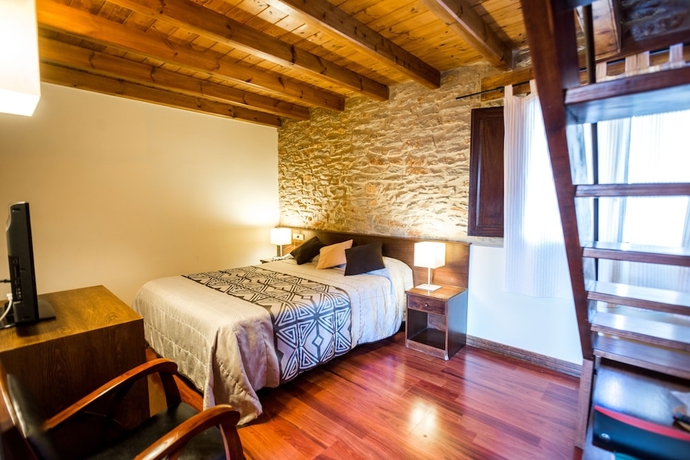 Imagen de la habitación del Alojamiento Rural El Faixero. Foto 15