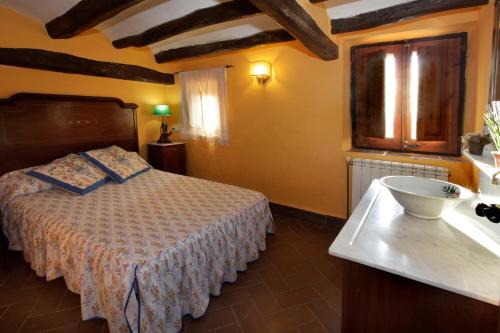 Imagen de la habitación del Alojamiento Rural Mas la Planella Masia de Turismo Rural. Foto 19
