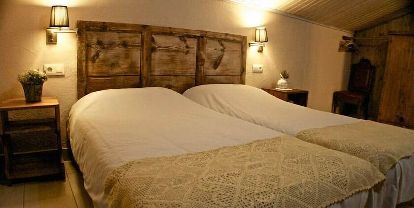 Imagen de la habitación del Alojamiento Rural Puig-arnau Pubilló Poble Rural. Foto 12