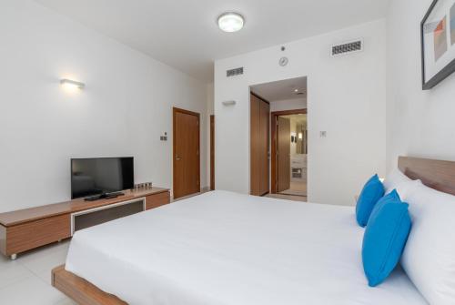 Imagen de la habitación del Apartahotel Adagio Abu Dhabi Al Bustan. Foto 9