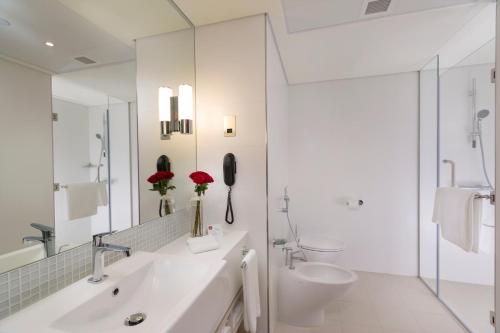 Imagen de la habitación del Apartahotel Adagio Abu Dhabi Al Bustan. Foto 11