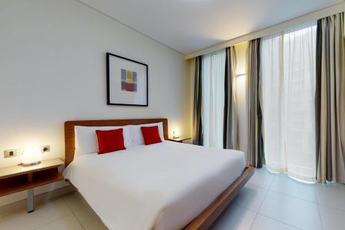 Imagen de la habitación del Apartahotel Adagio Abu Dhabi Al Bustan. Foto 16