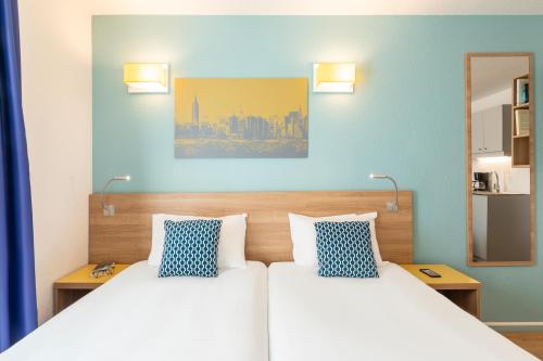 Imagen de la habitación del Apartahotel Adagio Access La Défense Place Charras. Foto 17