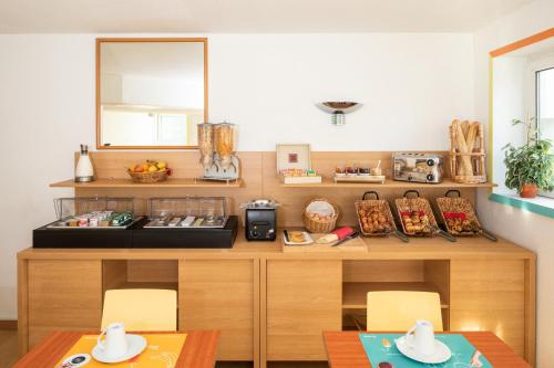 Imagen del bar/restaurante del Apartahotel Adagio Access La Défense Place Charras. Foto 9