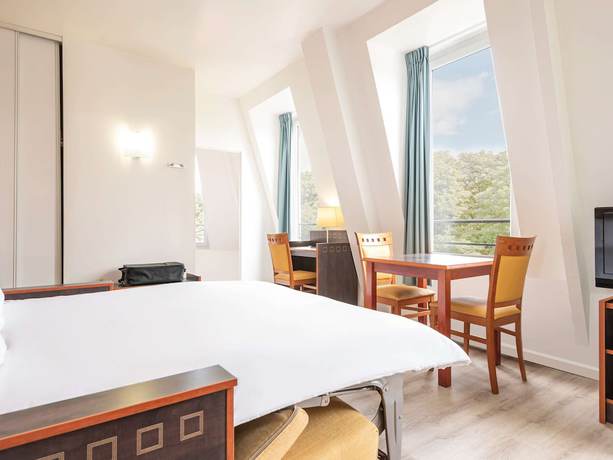 Imagen de la habitación del Apartahotel Adagio Access Paris Philippe Auguste. Foto 9