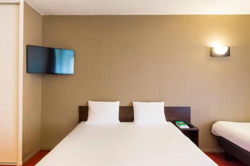 Imagen de la habitación del Apartahotel Adagio Access Paris Vanves Porte De Versailles. Foto 16