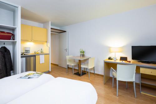 Imagen de la habitación del Apartahotel Adagio Access Rennes Centre. Foto 17