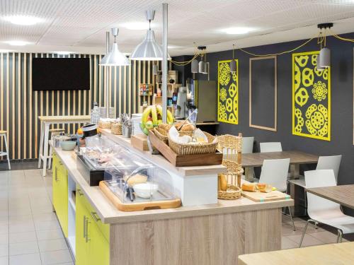 Imagen del bar/restaurante del Apartahotel Adagio Access Strasbourg Petite France. Foto 2