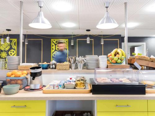 Imagen del bar/restaurante del Apartahotel Adagio Access Strasbourg Petite France. Foto 3