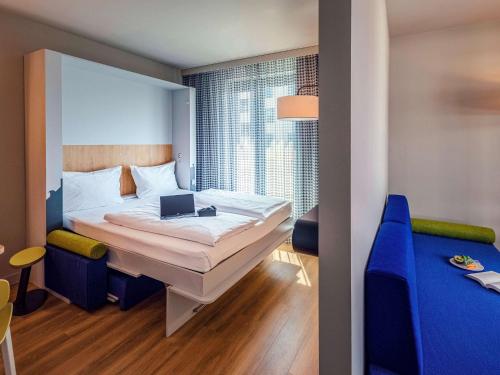 Imagen de la habitación del Apartahotel Adagio Access Stuttgart Airport Messe. Foto 13