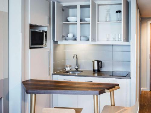 Imagen de la habitación del Apartahotel Adagio Edinburgh Royal Mile. Foto 16