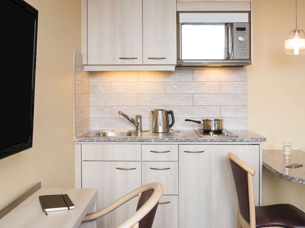 Imagen de la habitación del Apartahotel Adagio Geneve Mont Blanc. Foto 16