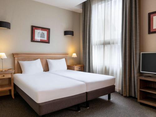 Imagen de la habitación del Apartahotel Adagio La Défense Esplanade. Foto 7