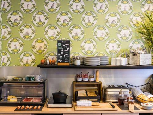 Imagen del bar/restaurante del Apartahotel Adagio La Defense Courbevoie. Foto 4