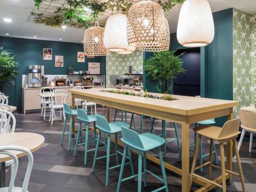 Imagen del bar/restaurante del Apartahotel Adagio La Defense Courbevoie. Foto 5