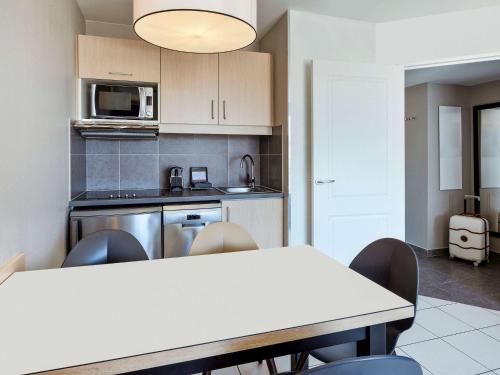 Imagen de la habitación del Apartahotel Adagio Monaco Monte Cristo. Foto 15