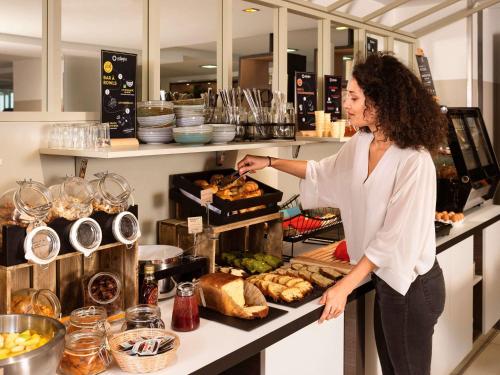 Imagen del bar/restaurante del Apartahotel Adagio Monaco Monte Cristo. Foto 6