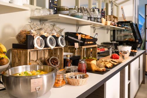 Imagen del bar/restaurante del Apartahotel Adagio Monaco Monte Cristo. Foto 7