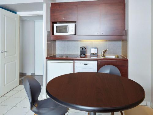 Imagen de la habitación del Apartahotel Adagio Monaco Monte Cristo. Foto 19