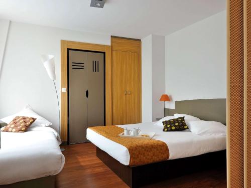 Imagen de la habitación del Apartahotel Adagio Nantes Centre. Foto 8